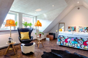 Studio på loftet i två plan in Sankt Olof